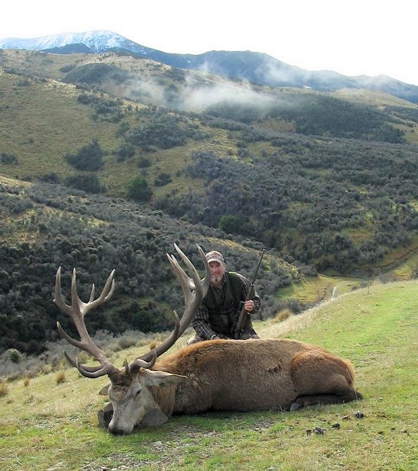 Andy and Kay Vail take a Silver Medal Red Stag at High Peak Game Estate