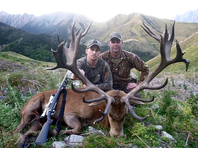 Clint Michels and his guide Tony with his red stag at Glen Dene