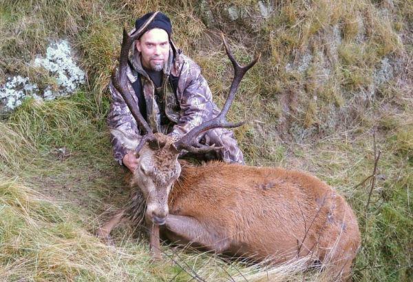 Dan Spiker with his red stag, hunting with Nic of Chris Jolly Outdoors